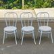 3 white steel and beige leather bistro chairs