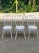 3 white steel and beige leather bistro chairs