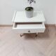 Vintage bedside table with compass foot
