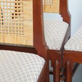 4 wooden Art Deco design dining chairs with a wicker seat and backrest