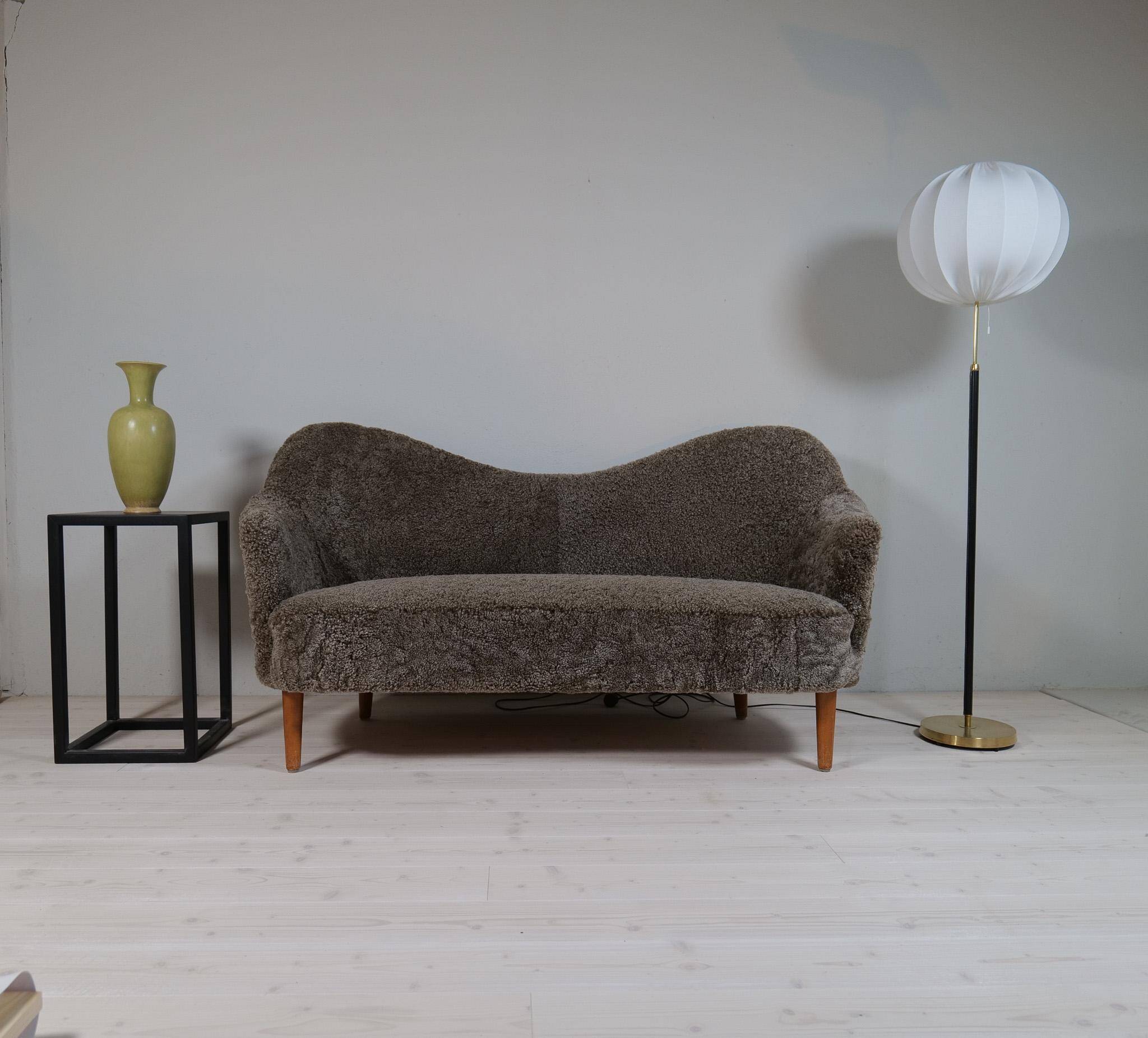 Mid-century black leather and brass floor lamp by Falkenbergs Belysning, Sweden, 1960s.