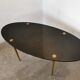 Oval coffee table in black opaline