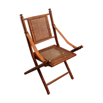 Bamboo folding chair and caning, leather and brass