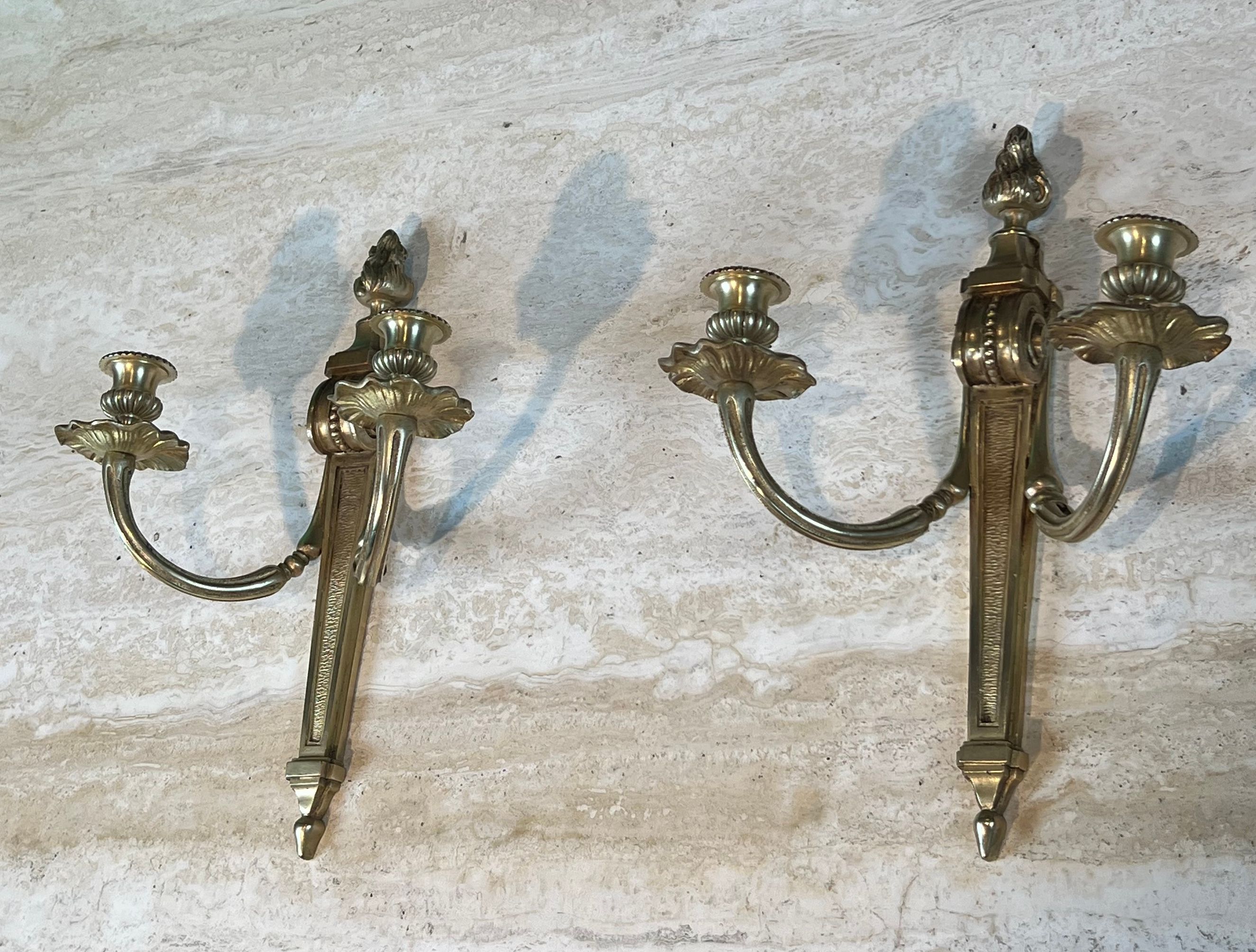 Pair of Louis XVI style bronze wall sconces