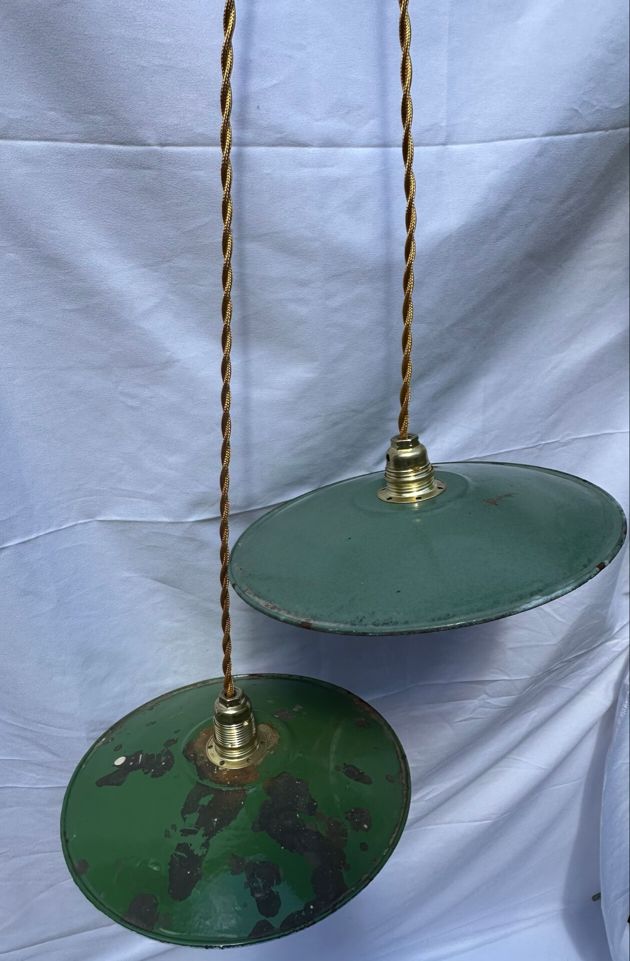 Old suspension pair in green and white enamelled sheet metal.