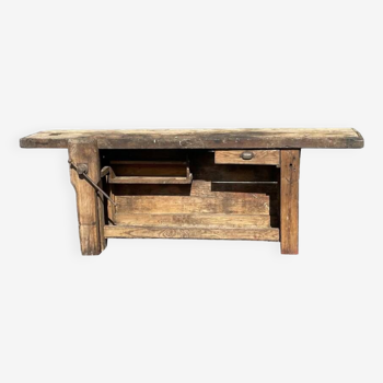 Old craft workbench in raw wood from the very beginning of the 19th century