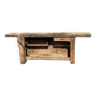 Old craft workbench in raw wood from the very beginning of the 19th century