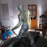 bronze sculpture athlete bending an iron bar by Jean de Roncourt on an art deco marble base