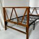 Two-seater bench convertible into a single bed.