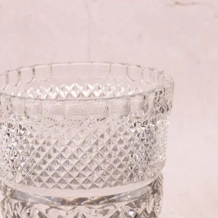 Elegant cut crystal vase in transparent Art Deco style.