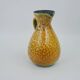 Large yellow ceramic pitcher in the Accolay style