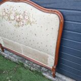 antique fabric and wood headboard