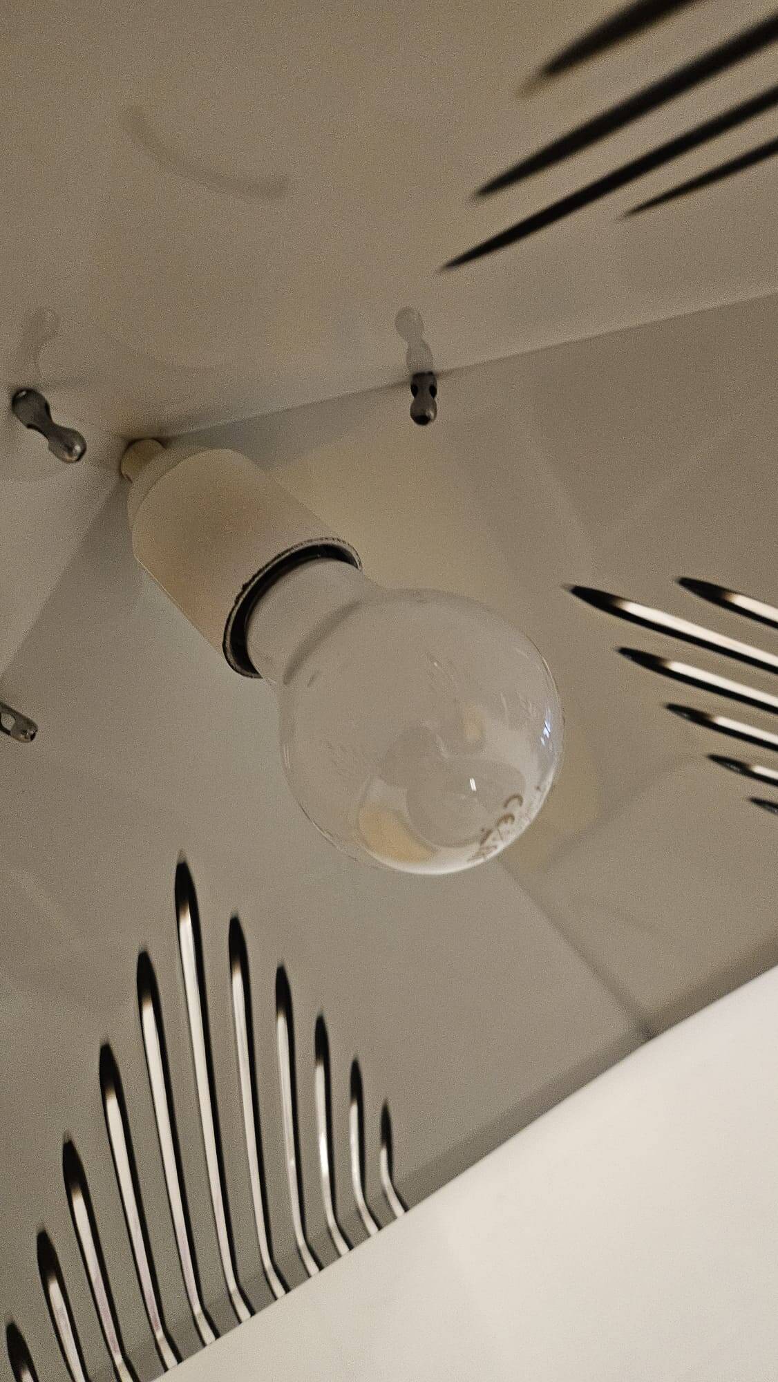 Black plexiglass pendant lamp from the 1980s, mounted on chains, originating from Italy.
