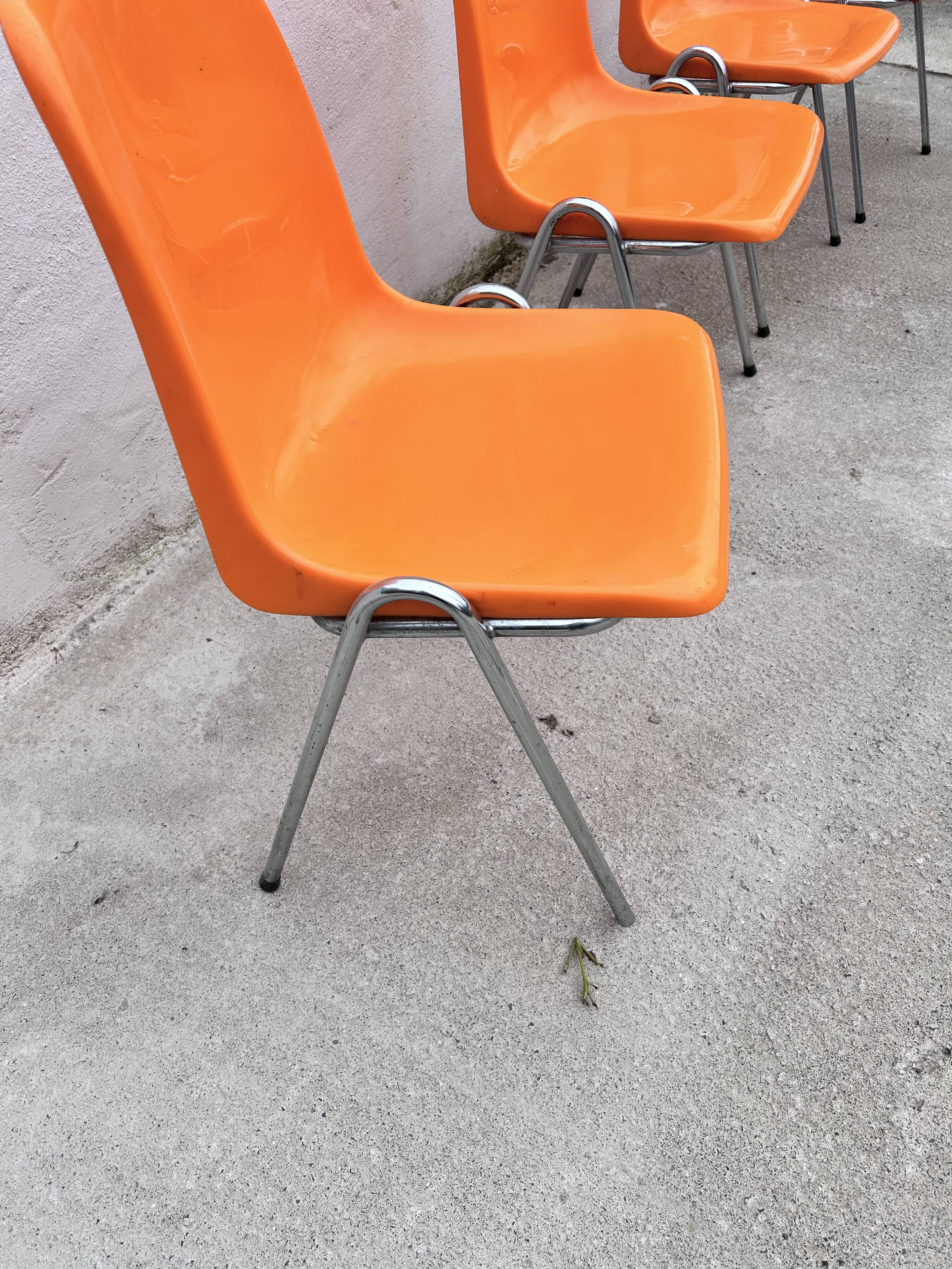 Orange plastic chairs