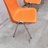 Orange plastic chairs