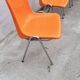 Orange plastic chairs