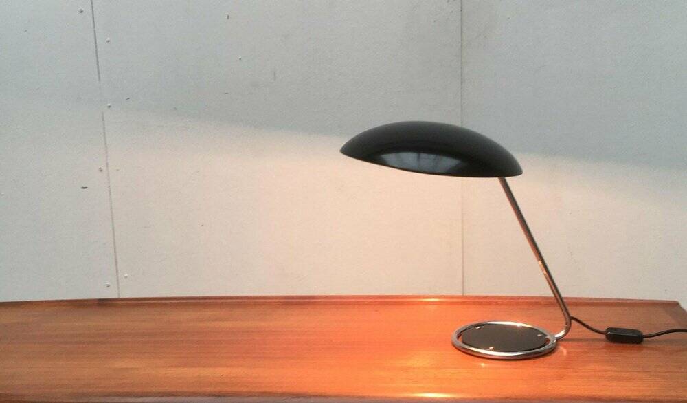 Metal table lamp model 6761 from the mid-century German period by Christian Dell for Kaiser Leuchten, 1960s.