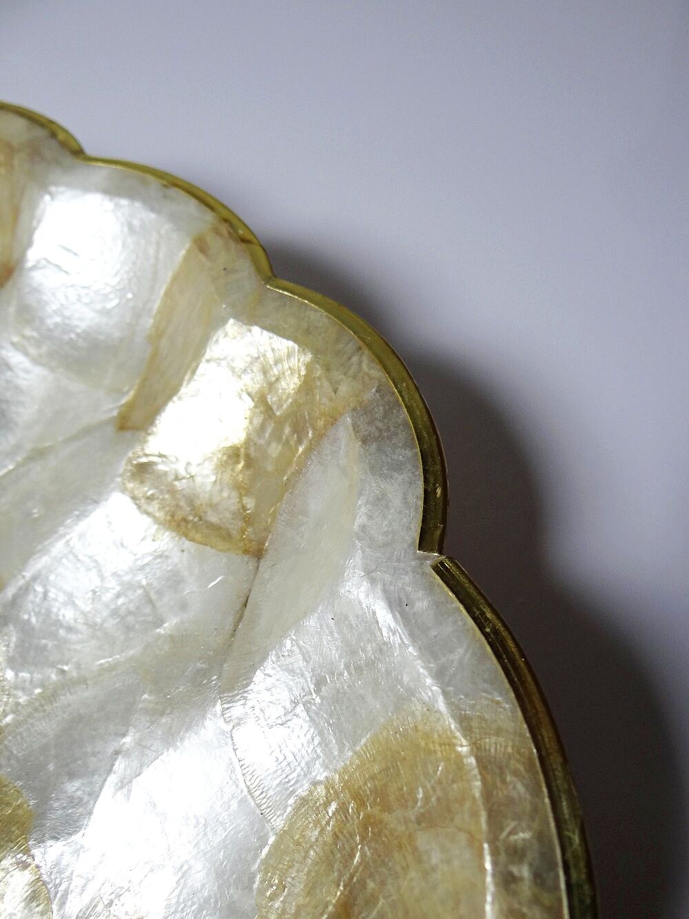 Large platter or shell-shaped catchall in capiz mother-of-pearl and vintage brass.