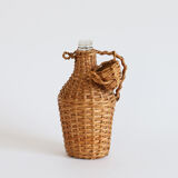 Bottle dressed in wicker