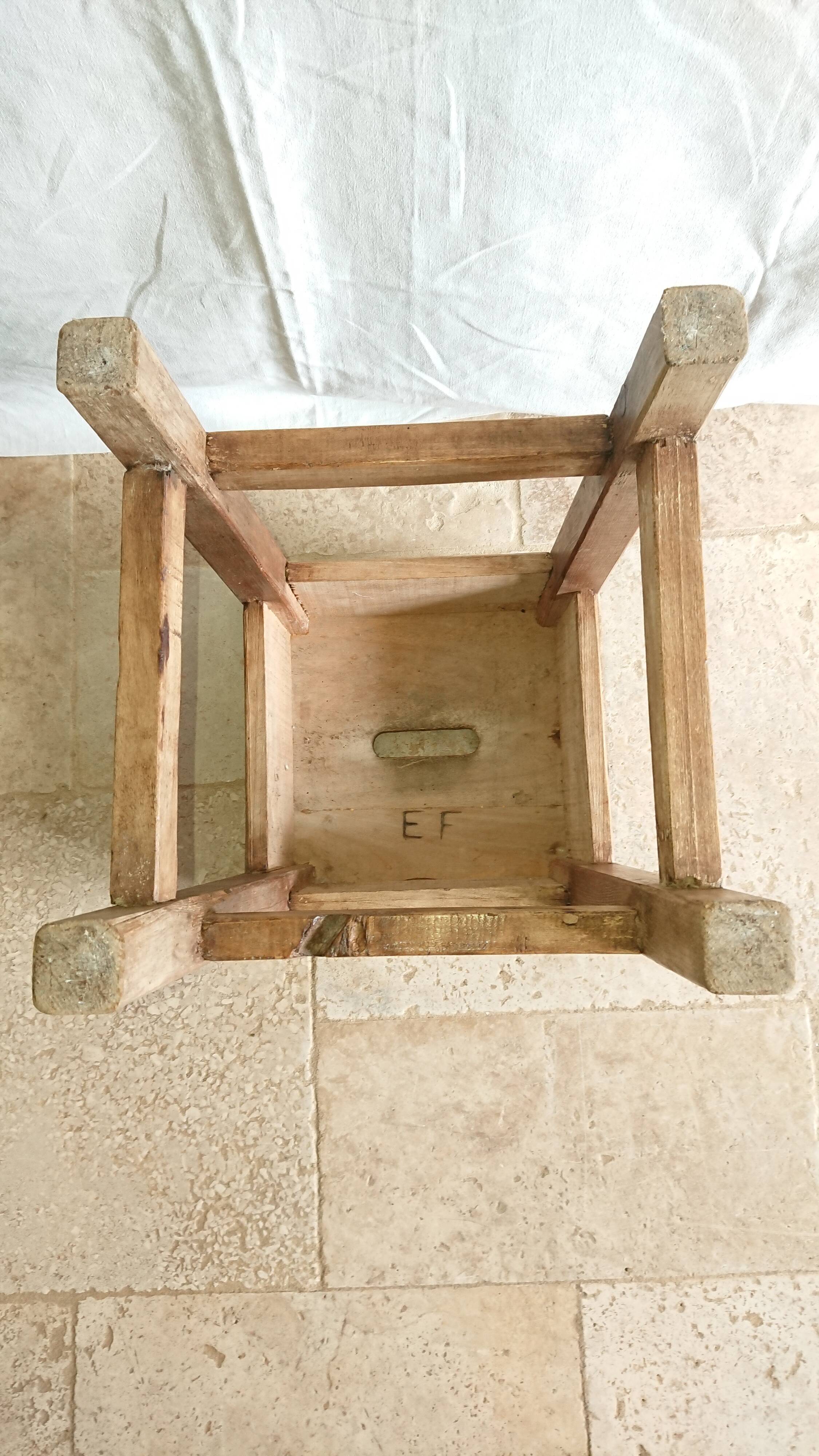 Raw wooden workshop stool