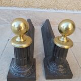 Pair of cast iron and bronze chenets