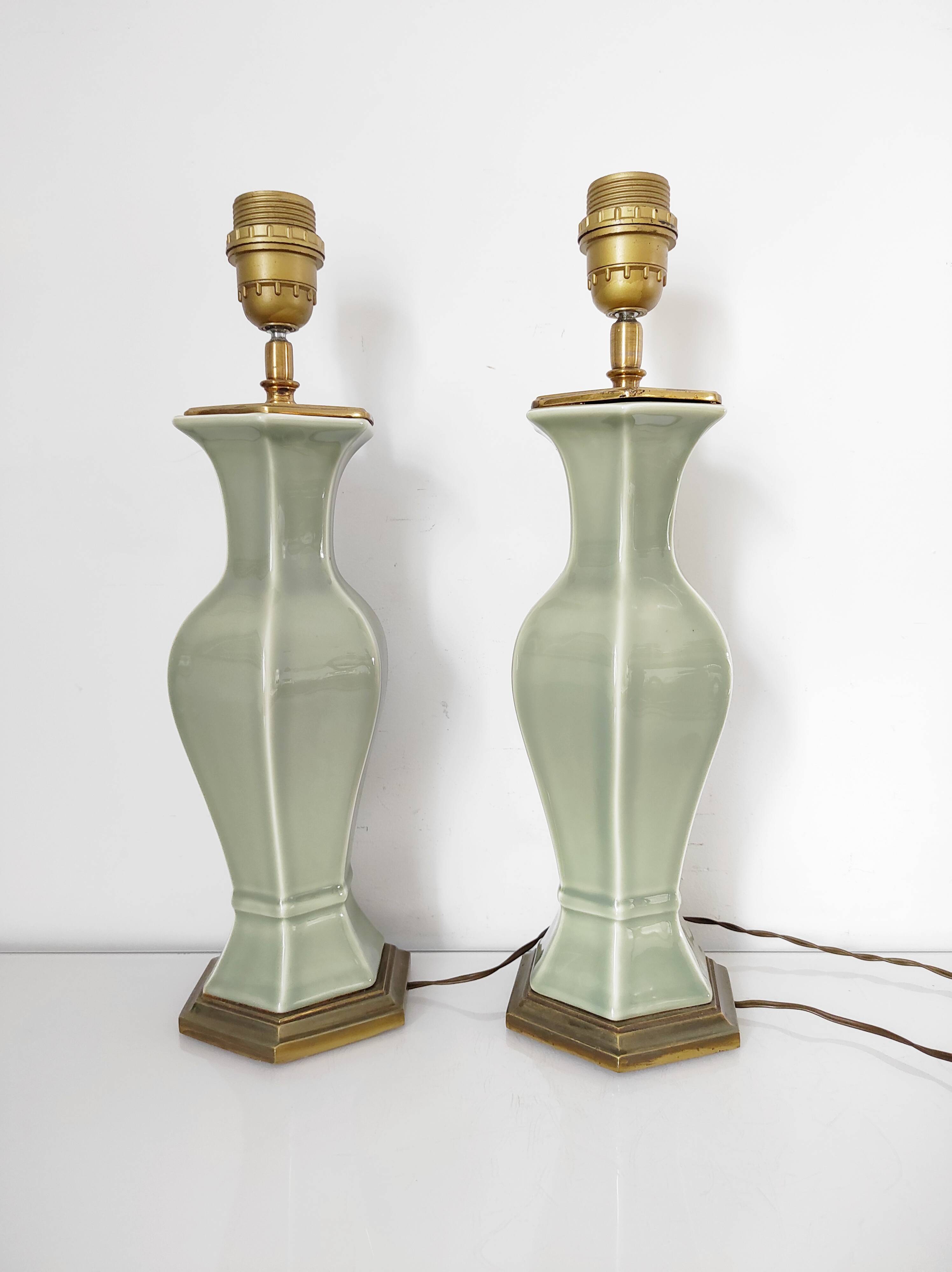 Two celadon-colored ceramic lamp bases