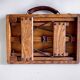 Old foldable fisherman's stool in wood and leather
