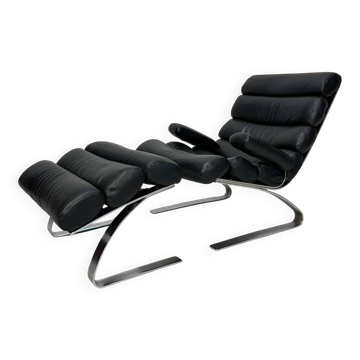 Fauteuil lounge en cuir noir COR Sinus avec repose-pieds