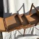 Deploying worker wood spindle feet