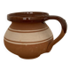 Hungarian folk ceramic pitcher in glossy brown and beige, traditional rounded pot.
