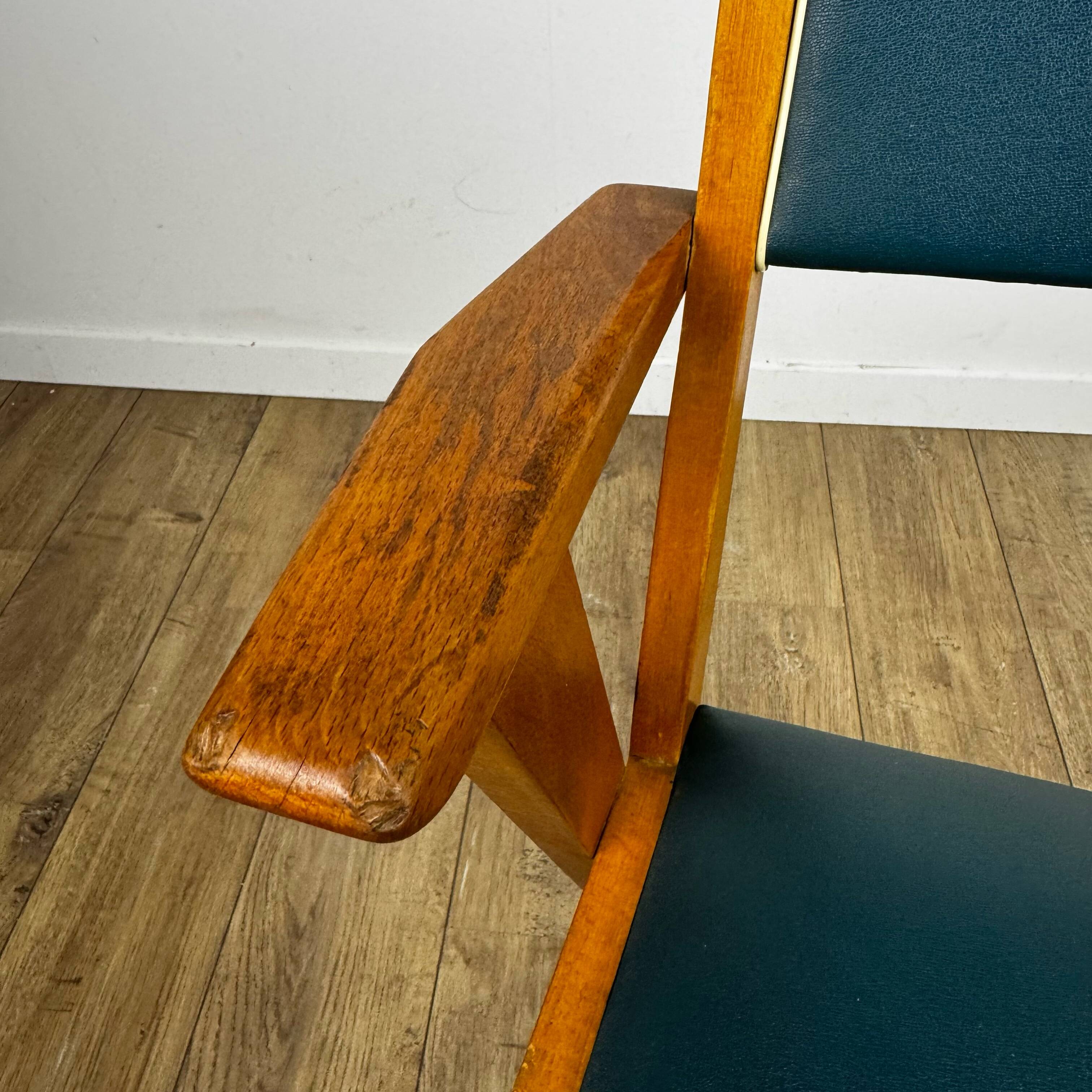 Pair of Scandinavian bridge armchairs in wood and vinyl from the 1950s.