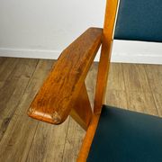 Pair of Scandinavian bridge armchairs in wood and vinyl from the 1950s.