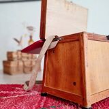 Old fisherman's stool with red seat
