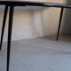 Vintage coffee table in laminate with geometric design, with tapered legs.