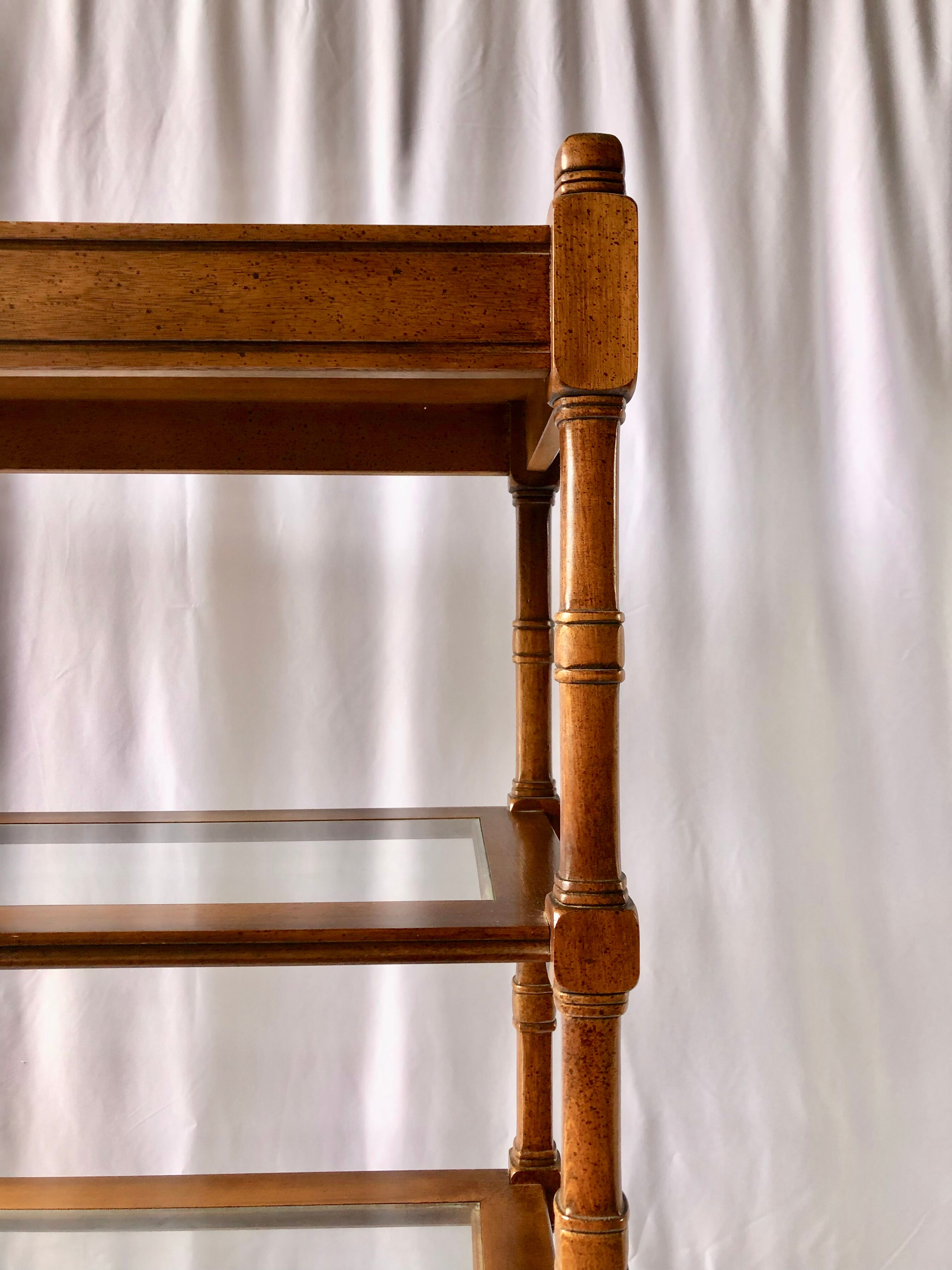 Classic wooden shelves, glass tops and cannage
