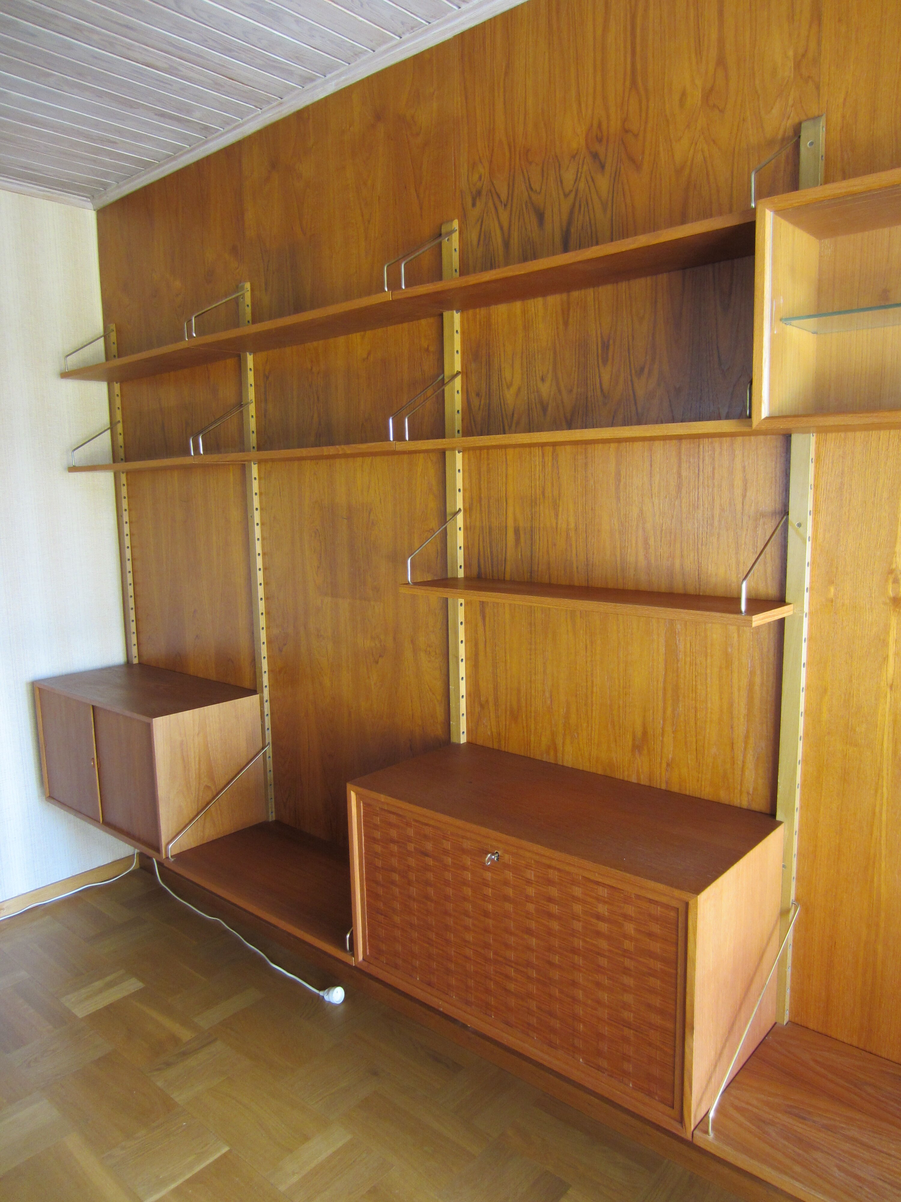 Royal system scandinavian wall shelf system by Poul Cadovius