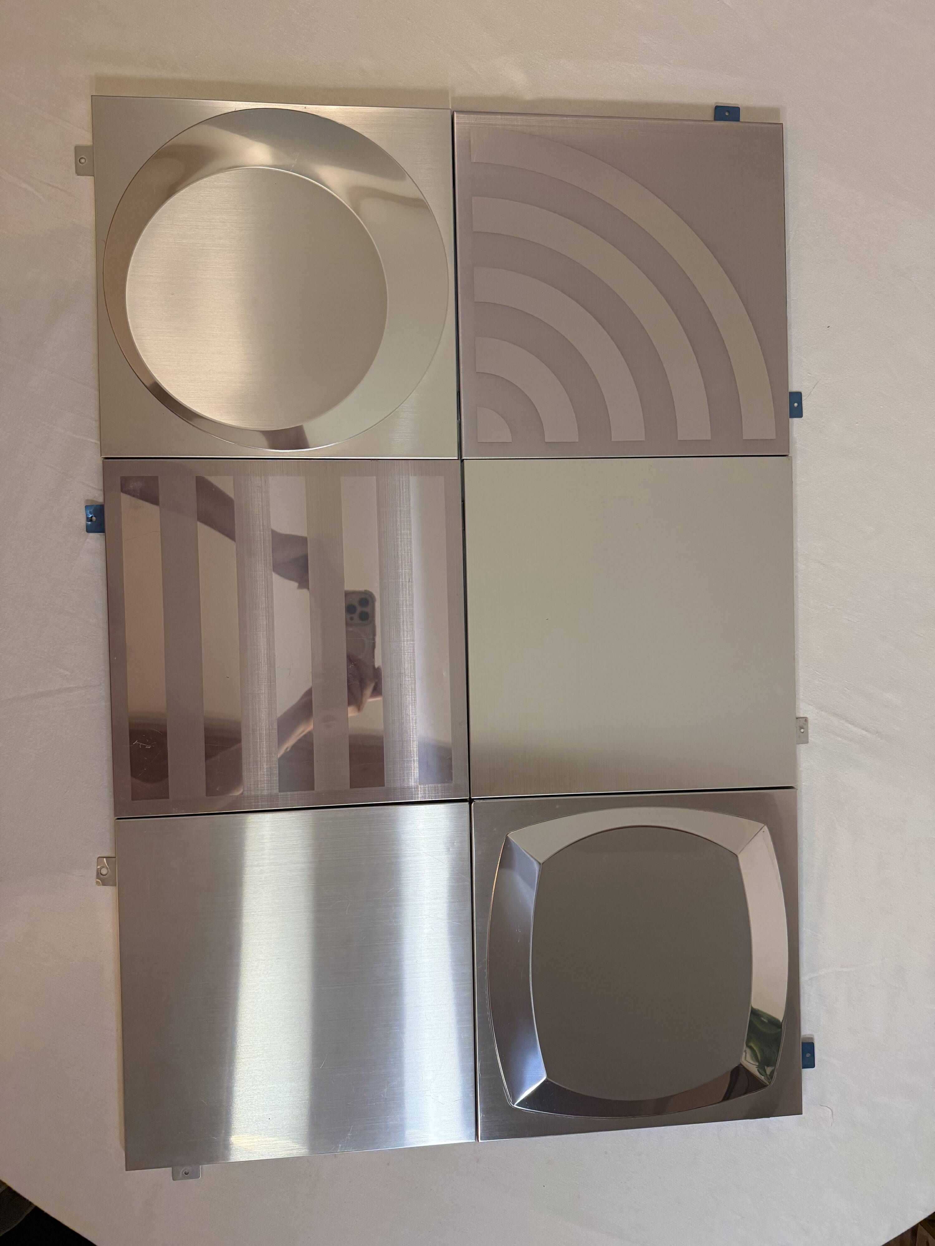 Set of 6 Space Age wall plaques, made of metal, geometric patterns.