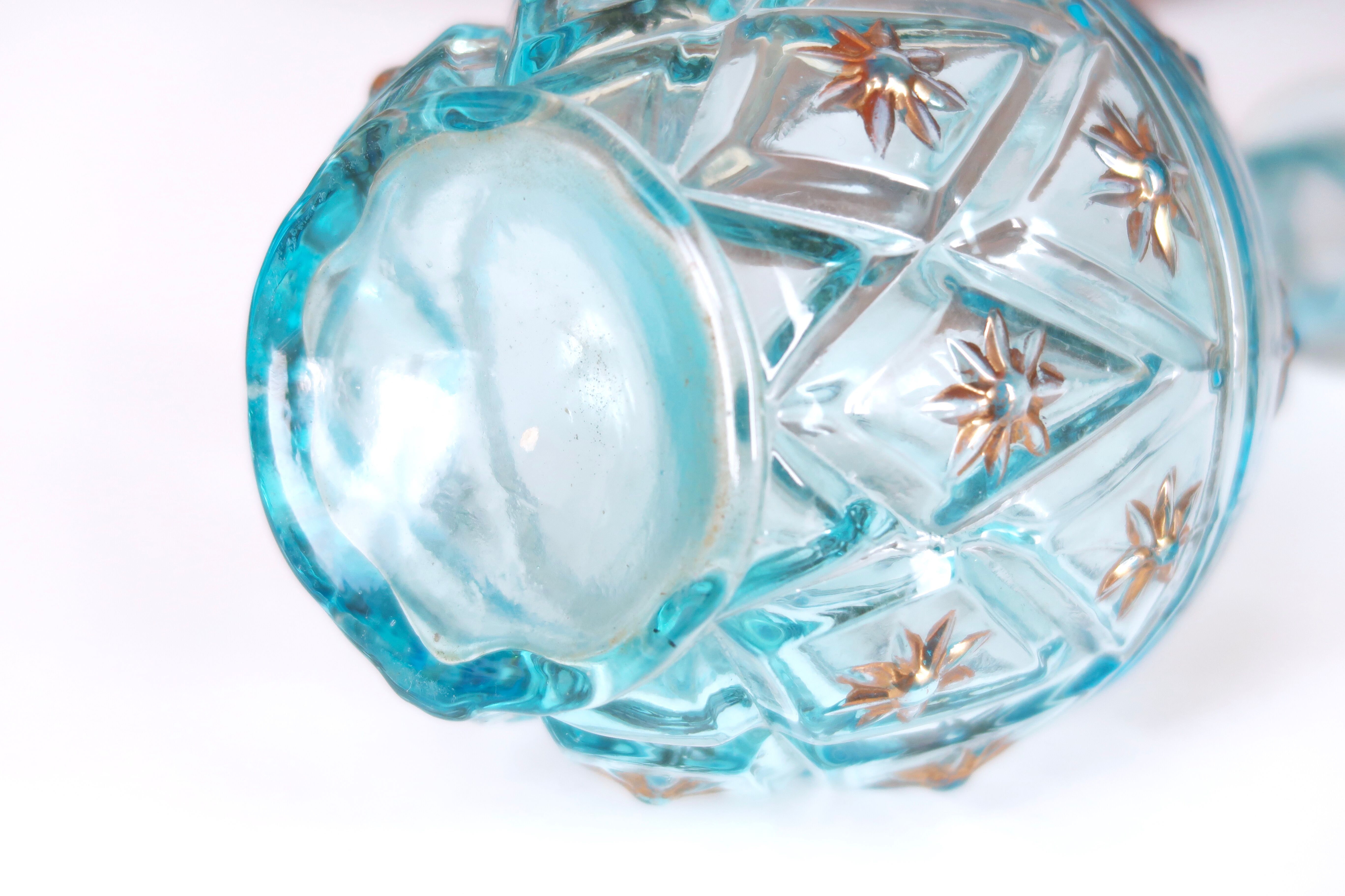Turquoise blue glass decanter, golden décor, 5O years