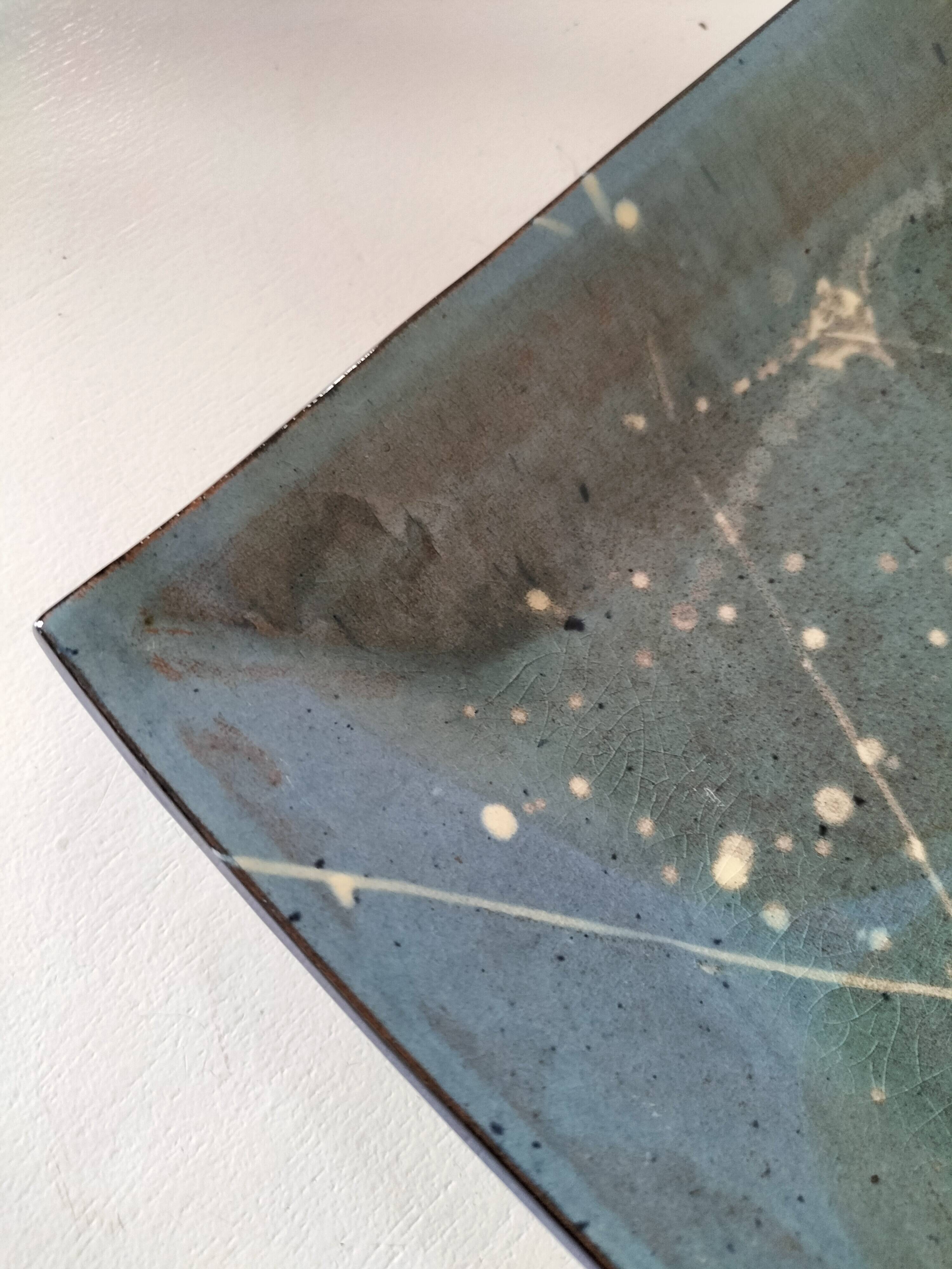 Square turquoise glazed stoneware dish, abstract floral decoration, signed.