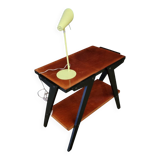 Vintage console design, sleek from the 1960s-70s.