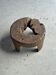 Small low circular four-legged stool in organic old teak with cut-out design H2