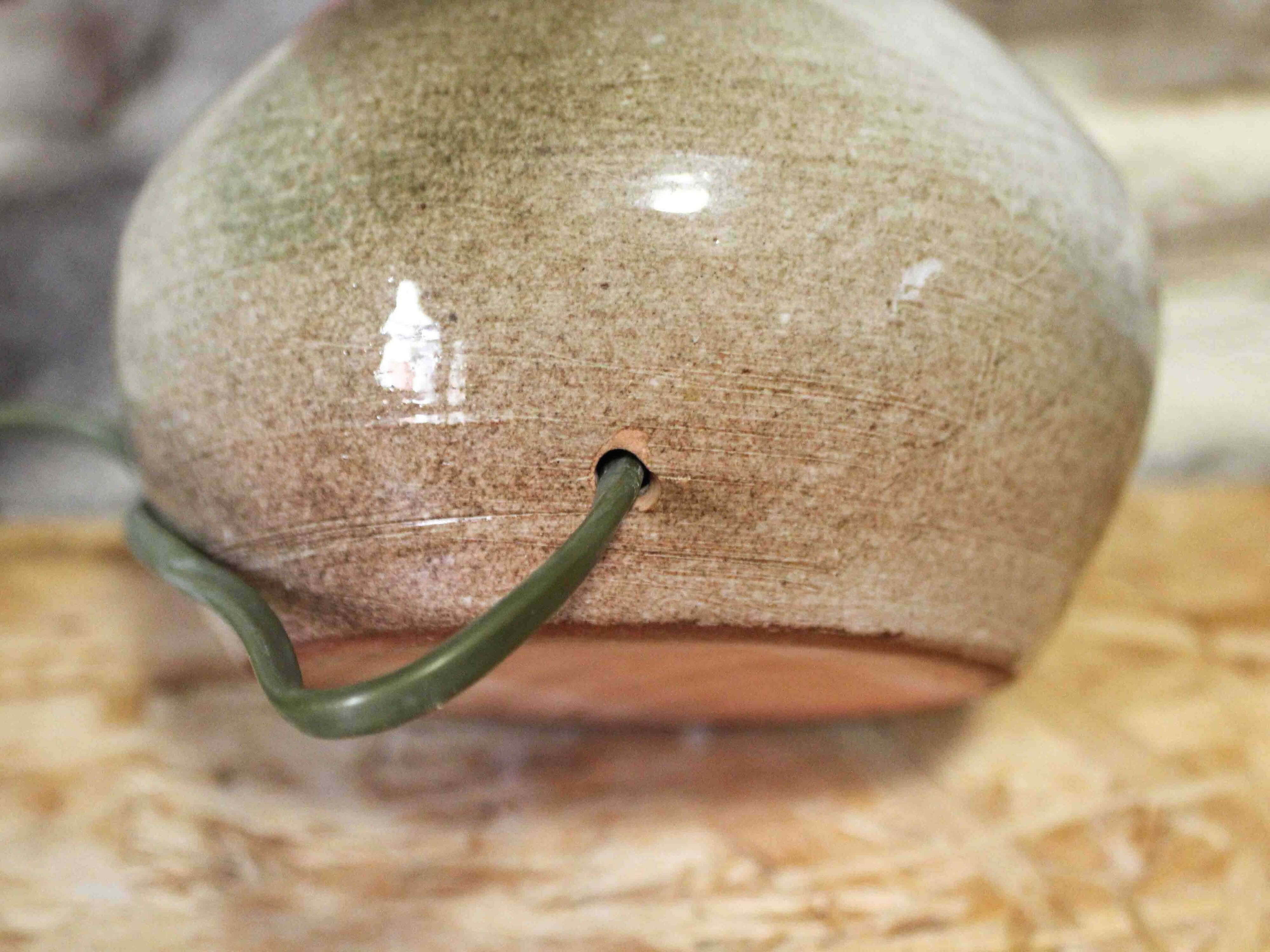 Ceramic lamp base with flower decoration