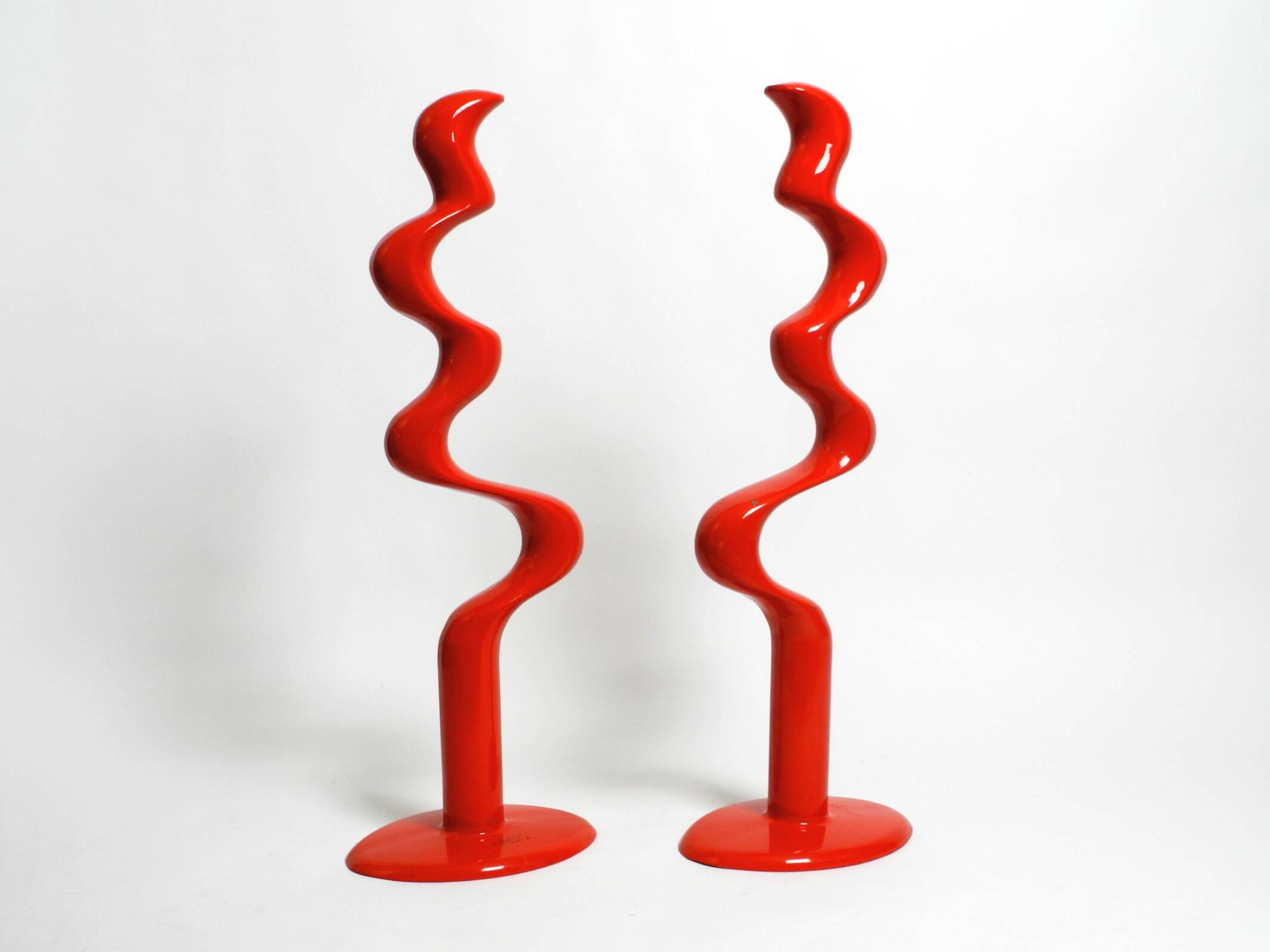 Two large limited abstract metal floor sculptures in red