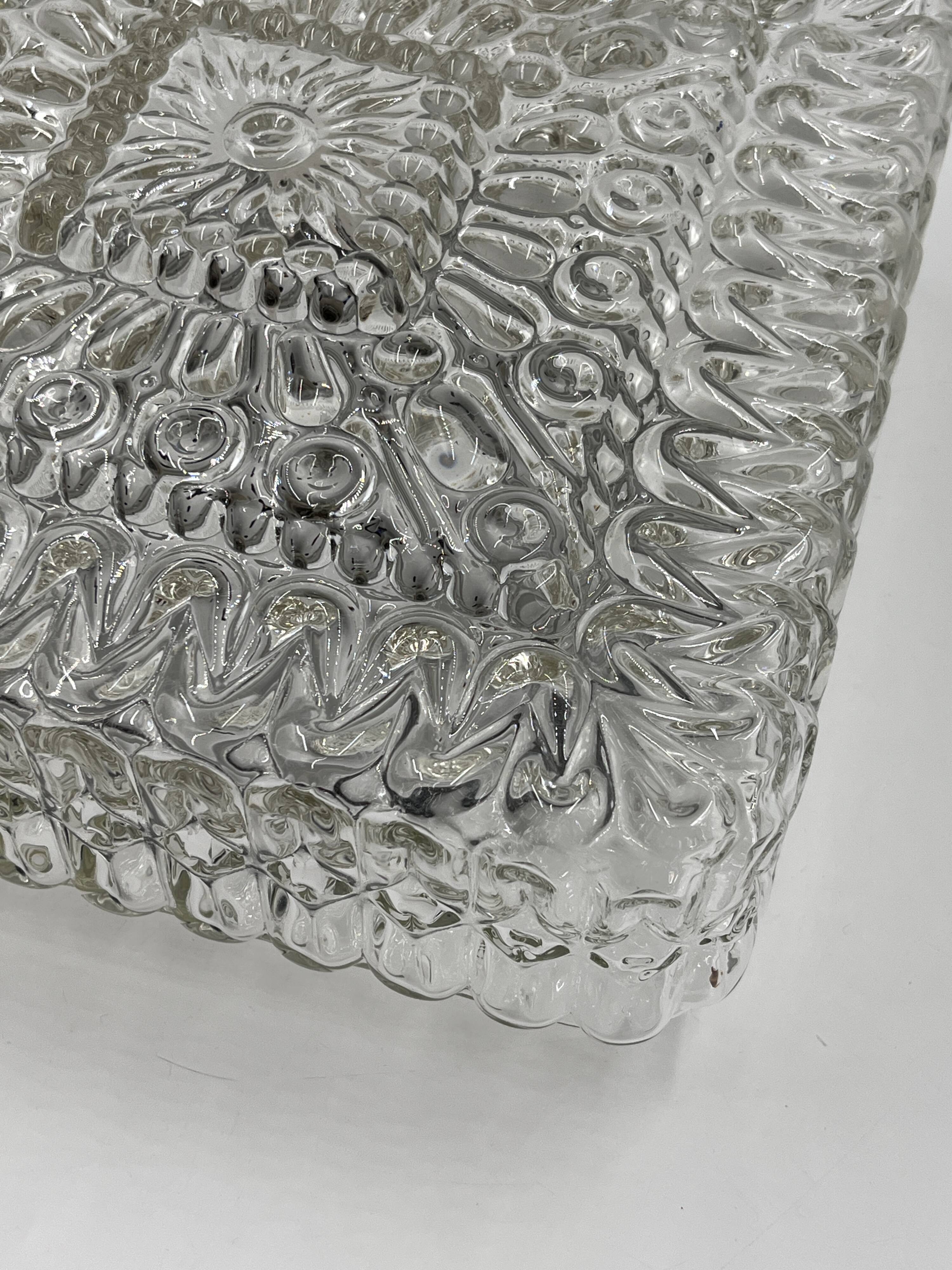 Square ceiling light in embossed molded glass