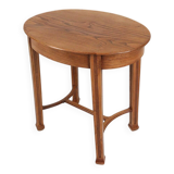 Timeless French Art Deco carved oval side table in oak, 1930s