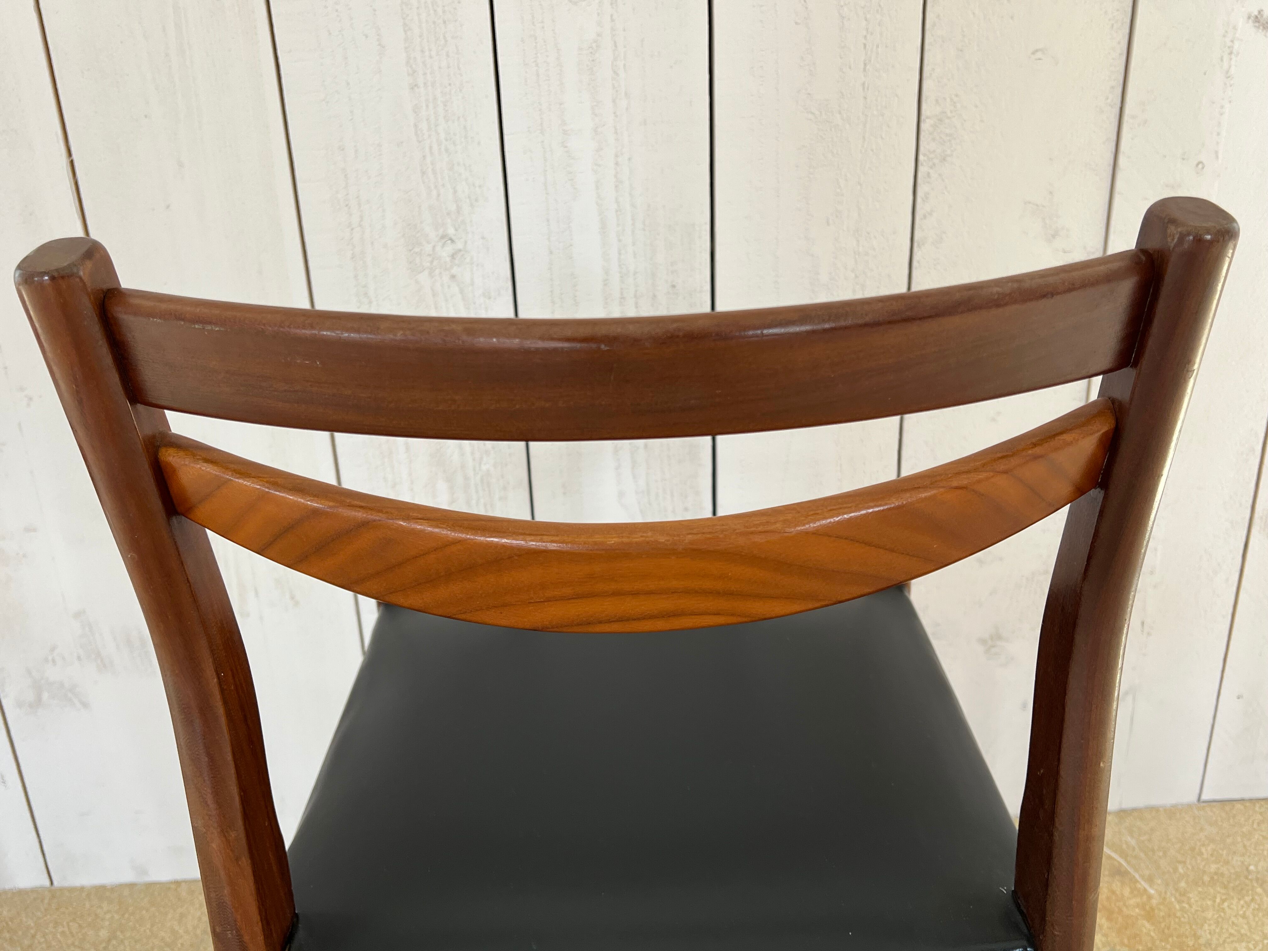 Scandinavian style teak and black skaï style chairs