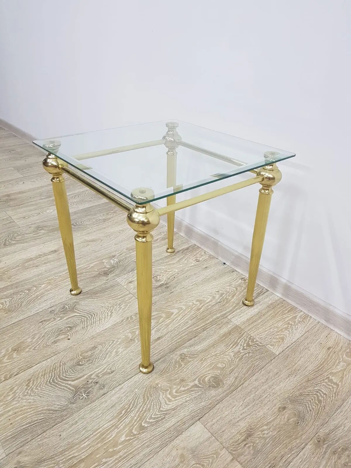 Side table, gold-tone brass, clear glass, France, 1960s.