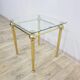 Side table, gold-tone brass, clear glass, France, 1960s.