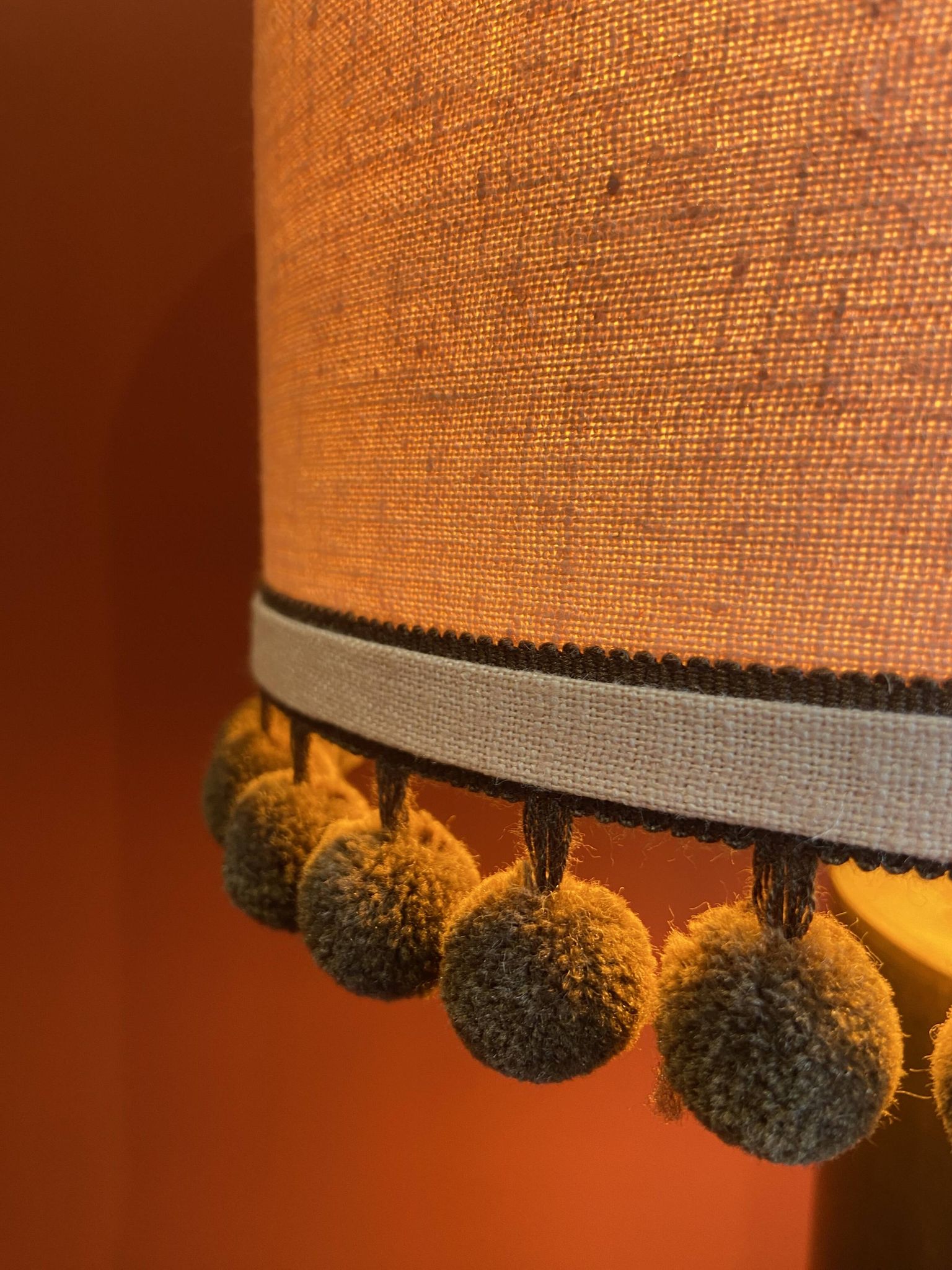 Copper "bouillotte" lamp with Ashoka Silk shade, pom-poms of c