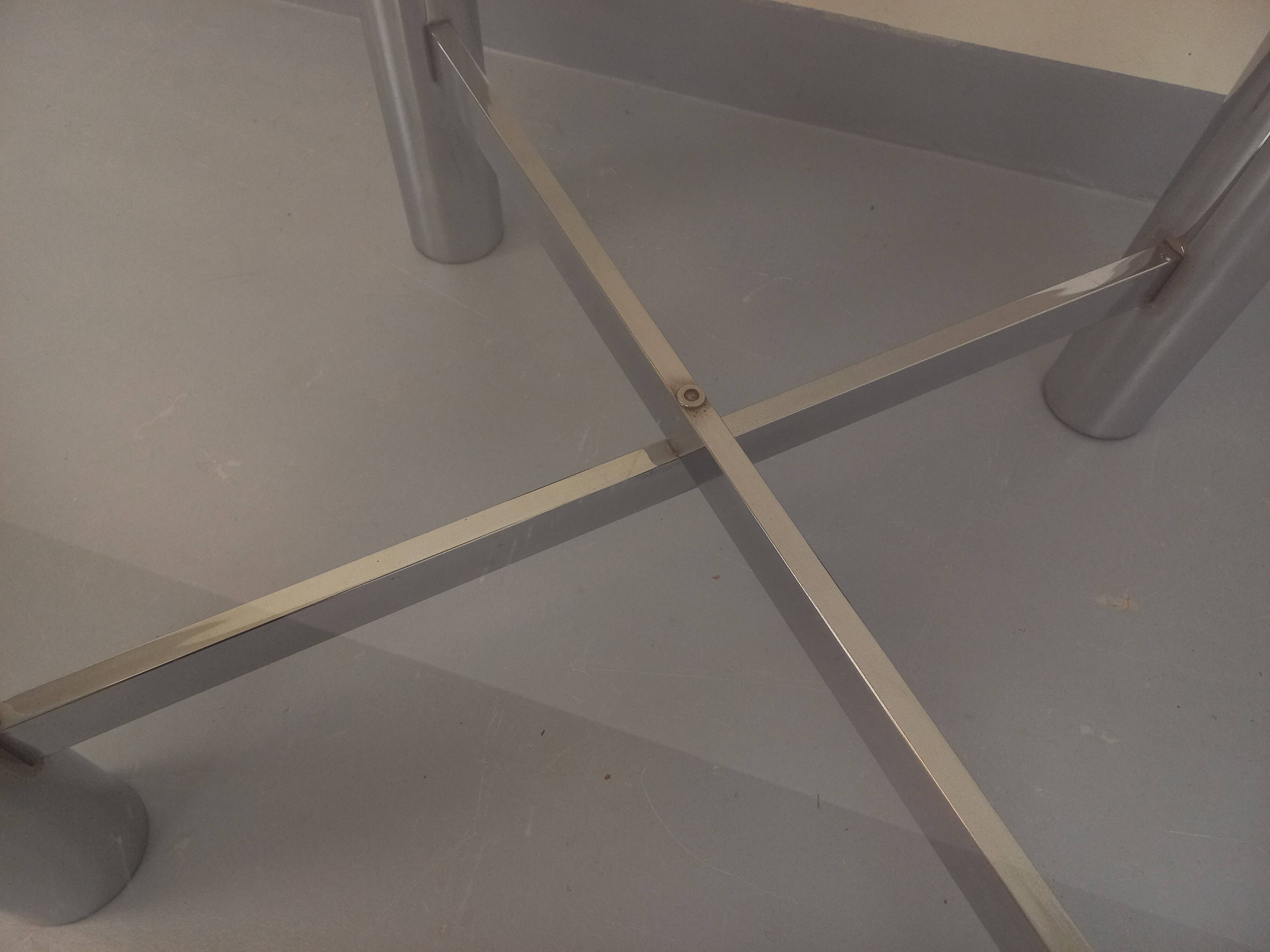 Square Italian vintage Space Age coffee table in smoked glass and metal.